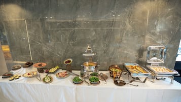 Daily buffet breakfast (USD 11 per person)
