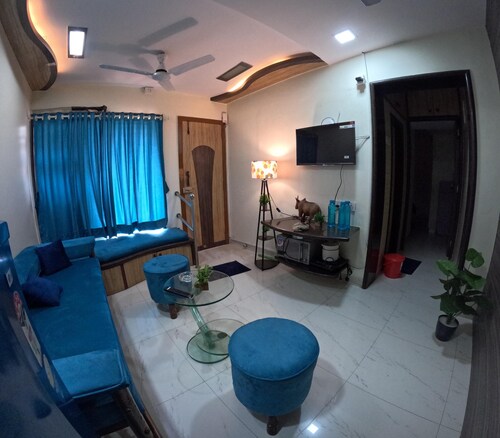 Cozy 1-bedroom apartment in wonderful Malad West with AC Near Vivanta Hospital