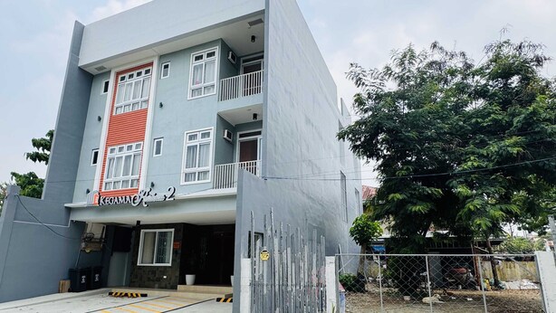 A multi-story building with a sign reading "Kegama Residence 2". - OYO 1158 Kegama Residences 2 (Dasmariñas)