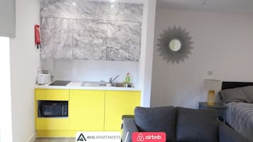 Fridge, microwave, stovetop, cookware/dishes/utensils