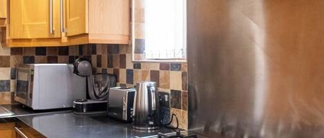 Microwave, oven, toaster, cookware/dishes/utensils