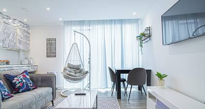 Stylish Central Studio With Hanging Chair – APT 2
