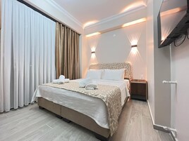 Ücretsiz minibar ürünleri, ücretsiz kablosuz İnternet, çarşaf takımı 