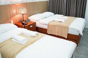 Deluxe Triple Room | Bed sheets