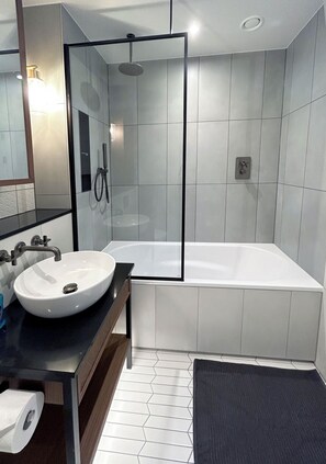 Shower, hair dryer, towels, soap