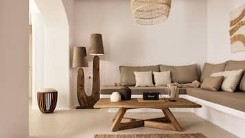 Villa Aethera Milos | Living area | 70-inch flat-screen TV with cable channels, Netflix, streaming services