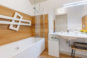 Shower, jetted tub, hair dryer, bidet
