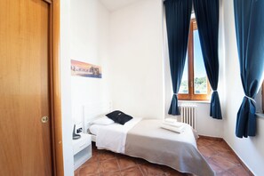 Single Room, City View | Desk, laptop workspace, blackout drapes, iron/ironing board