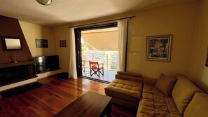 Lejlighed - 1 soveværelse - balkon | Stue | Bøger