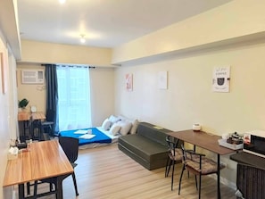 Condo, 1 Bedroom, Accessible, Patio | Living room - Avida Riala at Cebu IT Park Spacious 1 Bedroom With Fast Wifi Smart TV For 6 (Cebu City)