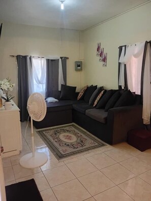 Living area - Modern and comfortable 2 bedroom flat 2 (Portmore)