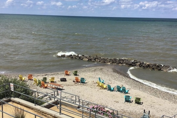 On the beach, sun loungers, beach towels