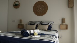 1 habitación, tabla de planchar con plancha, wifi gratis y ropa de cama
