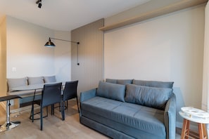 Basic Apartment | Living area | TV - Apt Charming Prox the Beach of Canas Idf105 (Florianópolis)
