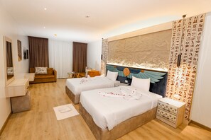 Standard Triple Room, Garden View | In-room safe, blackout drapes, soundproofing, iron/ironing board - Sultan Pyramids View INN (Giza)