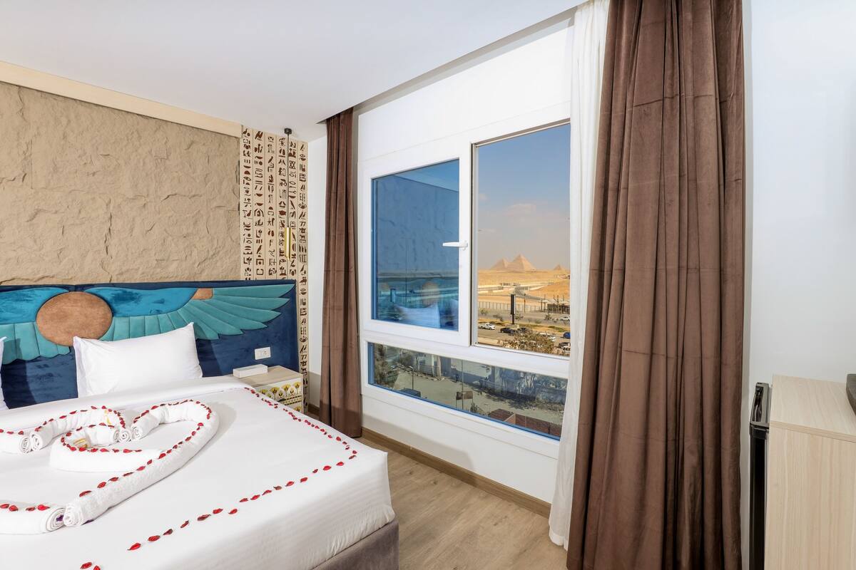 Deluxe Double Room, City View | In-room safe, blackout drapes, soundproofing, iron/ironing board