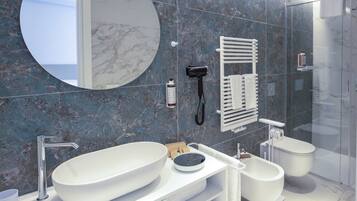 Shower, free toiletries, hair dryer, slippers