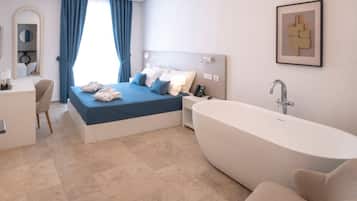 Deluxe Room, City View | Minibar, in-room safe, desk, laptop workspace