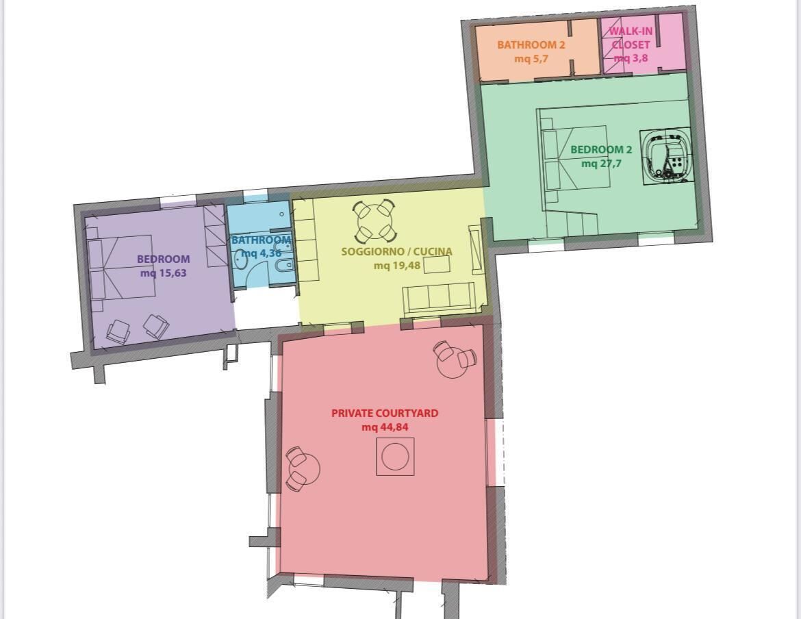A floor plan with a private courtyard, two bedrooms, a kitchen, two bathrooms, and a walk-in closet.
