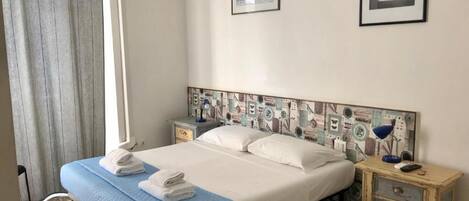 Deluxe Triple Room | Premium bedding, laptop workspace, soundproofing, WiFi (free)