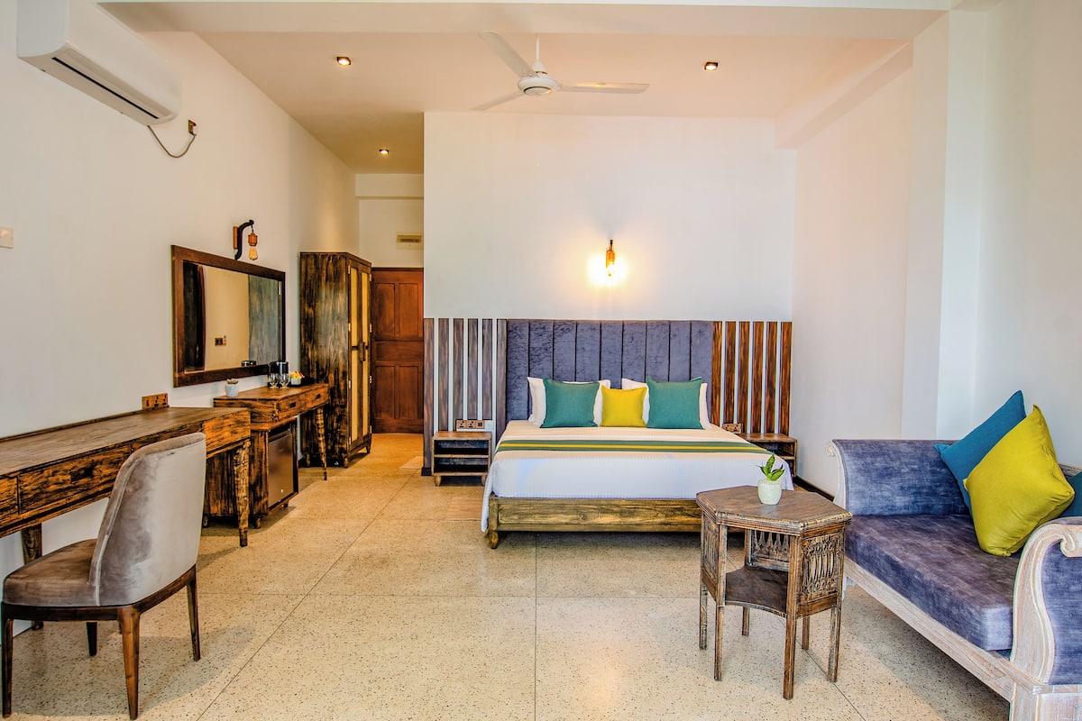 Deluxe Double Room, Balcony, Ocean View | In-room safe, desk, blackout curtains, iron/ironing board