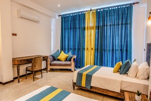 Deluxe Twin Room, Balcony, Ocean View | In-room safe, desk, blackout curtains, iron/ironing board