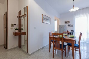 Apartment, 2 Bedrooms | Living area | 30-inch TV with satellite channels