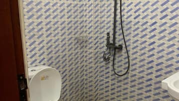 Shower, towels, soap, toilet paper