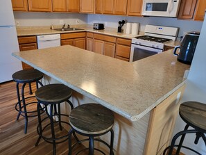 Private kitchen - 2-bedroom ranch apartment in awesome Manistee with WiFi, AC and pet friendly! (Manistee)