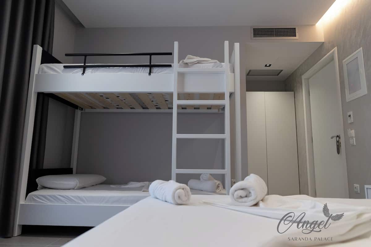 Economy Quadruple Room, Balcony, Mountain View | In-room safe, soundproofing, WiFi (free)