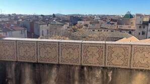A view from a balcony overlooking a cityscape with a patterned wall in the foreground. - T2 Design - Montpellier Centre (Montpellier)