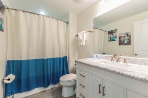 Jetted bath, hair dryer, towels, soap