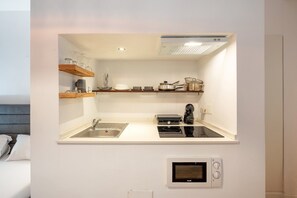 Fridge, microwave, coffee/tea maker, toaster