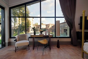 Habitació doble Deluxe | Cobrellits i matalassos amb encoixinament addicional