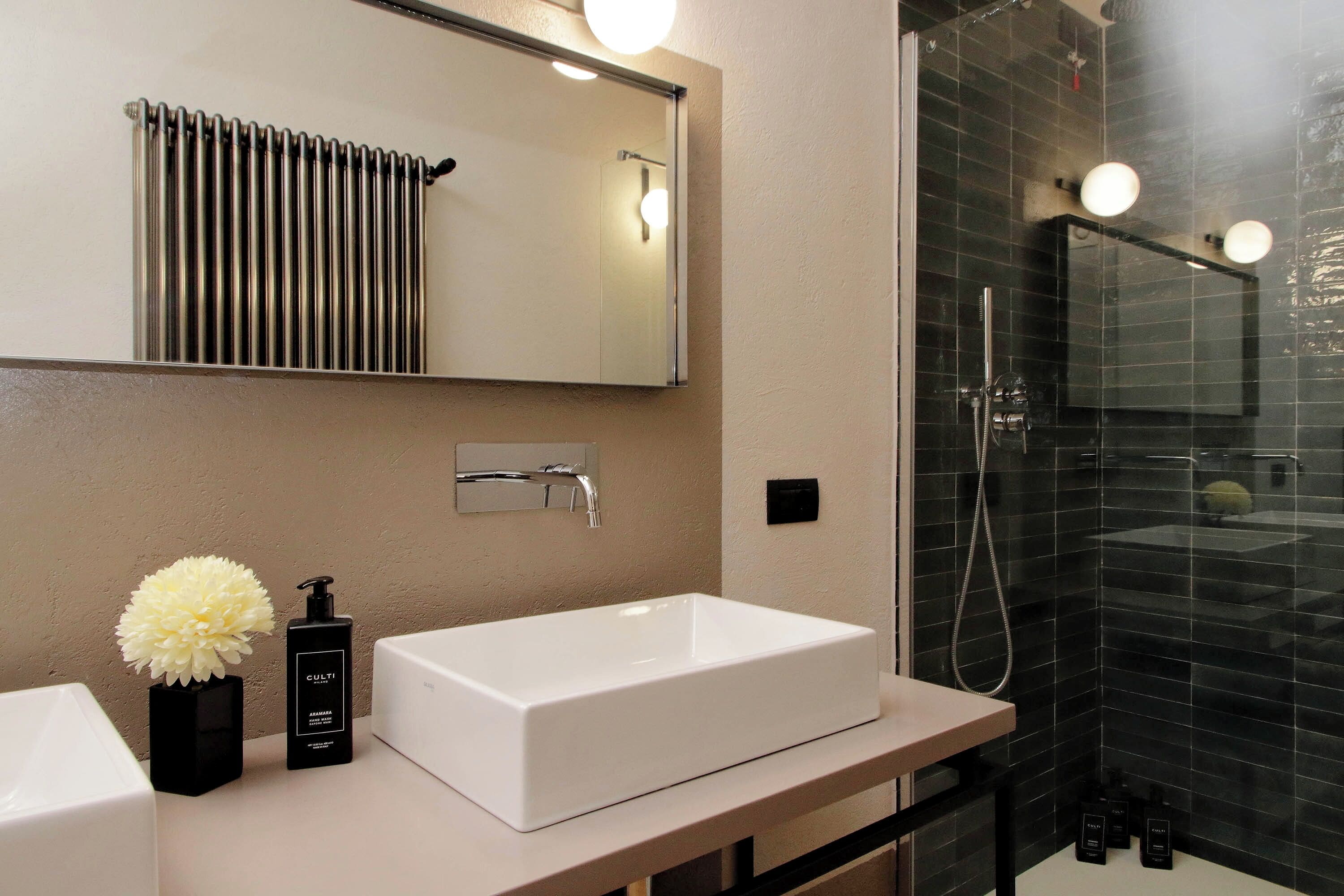 Designer toiletries, hair dryer, bidet, towels