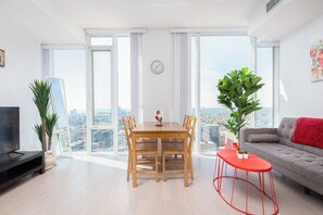 Suite, 1 Queen Bed, Non Smoking, City View | Living area | 55-inch LED TV with cable channels - Entertainment District Suites -DT TO (Toronto)