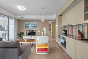 Deluxe Apartment | Living area | 55-inch LED TV with cable channels - Entertainment District Suites -DT TO (Toronto)