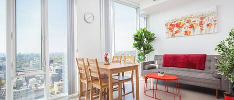 Suite, 1 Queen Bed, Non Smoking, City View | Living area | 55-inch LED TV with cable channels