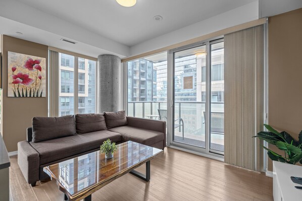 Deluxe Apartment | Living area | 55-inch LED TV with cable channels - Entertainment District Suites -DT TO (Toronto)