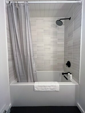 Hair dryer, towels, soap, shampoo