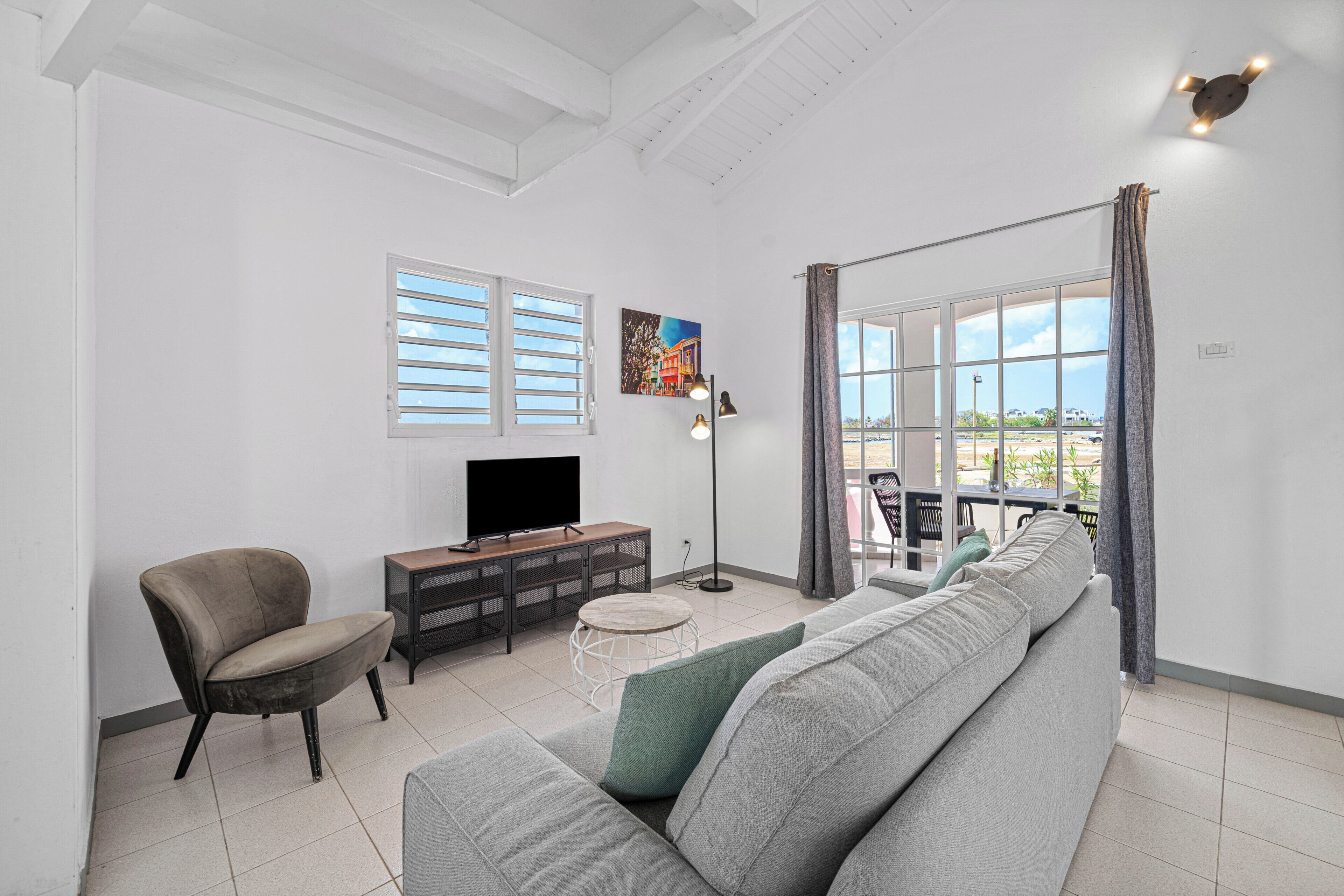 Apartamento luxo, cozinha americana | Área de estar | TV