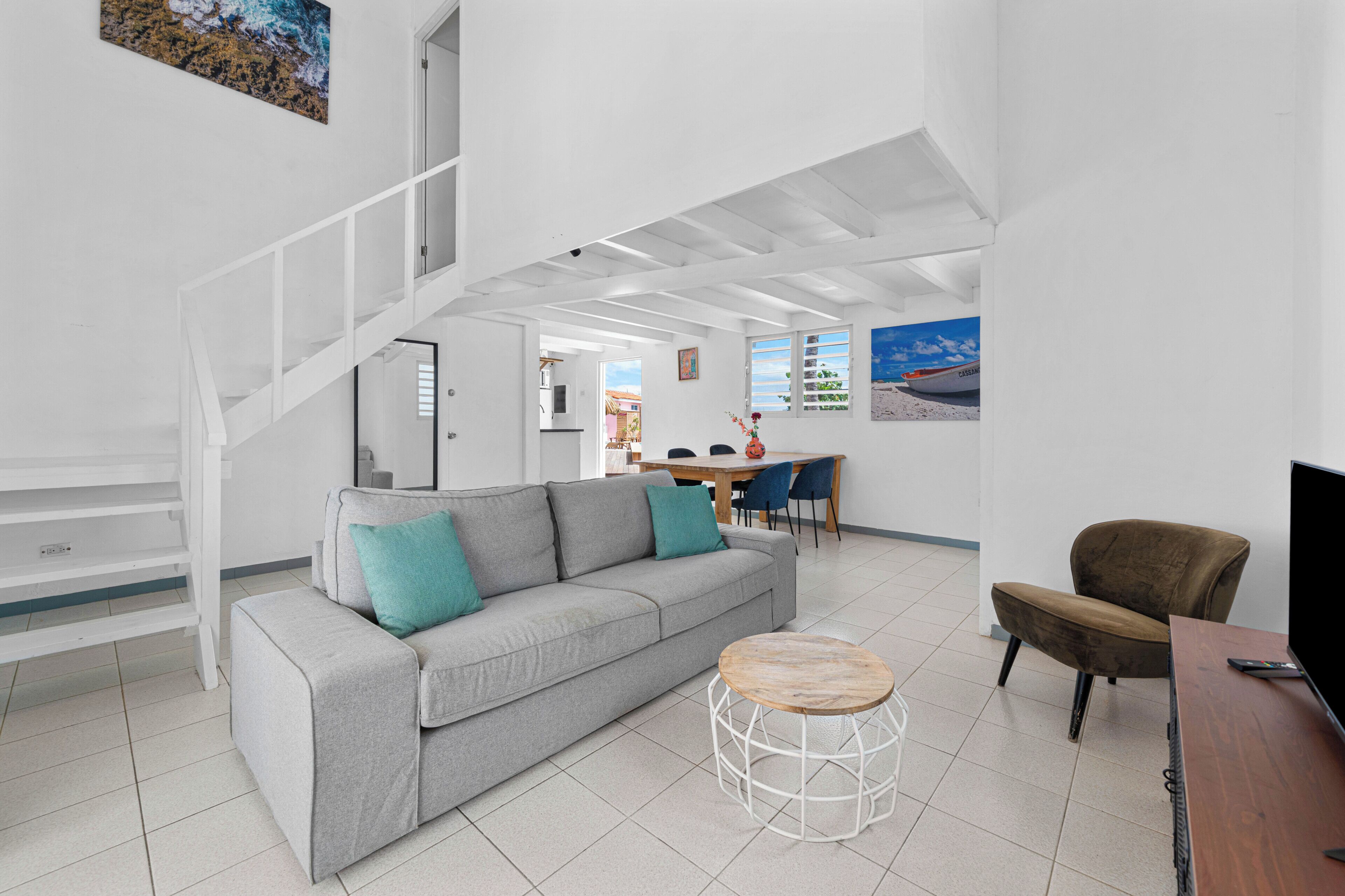 Deluxe Apartment, Kitchenette | Living area | TV