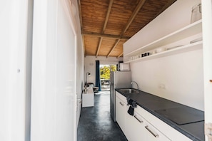 Studio Suite, 1 King Bed | Private kitchen | Full-size fridge, oven, stovetop, cookware/dishes/utensils - Pink Lagoon by Boutique Bonaire Unique Resorts (Kralendijk)