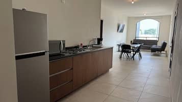 Family Apartment | Private kitchen | Fridge, microwave, espresso maker, cookware/dishes/utensils
