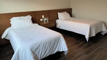 Family Apartment, Garden View | Blackout curtains, iron/ironing board, free WiFi, bed sheets