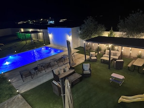 Outdoor pool, open 9:00 AM to 11:00 PM, free cabanas, pool umbrellas