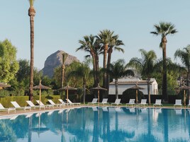 Seasonal outdoor pool, pool loungers