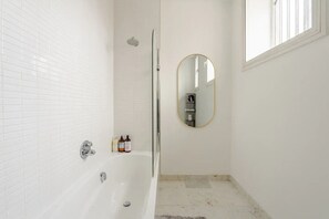 Hair dryer, towels, soap, shampoo