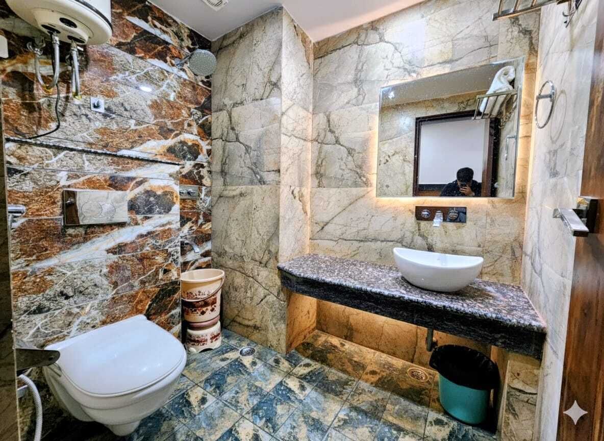 Ducha, artículos de tocador gratuitos, toallas, jabón