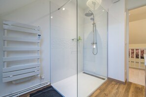 Shower, hair dryer, towels, soap